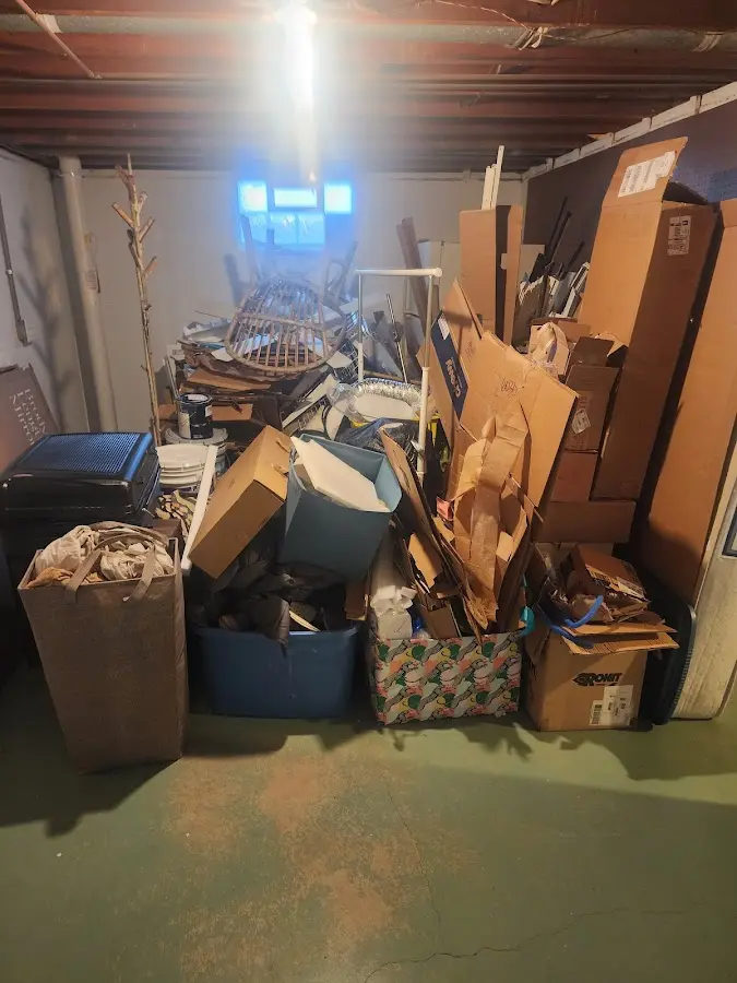 Roll-off dumpster container at job site for 15 Yard Dumpster Rental in Randolph